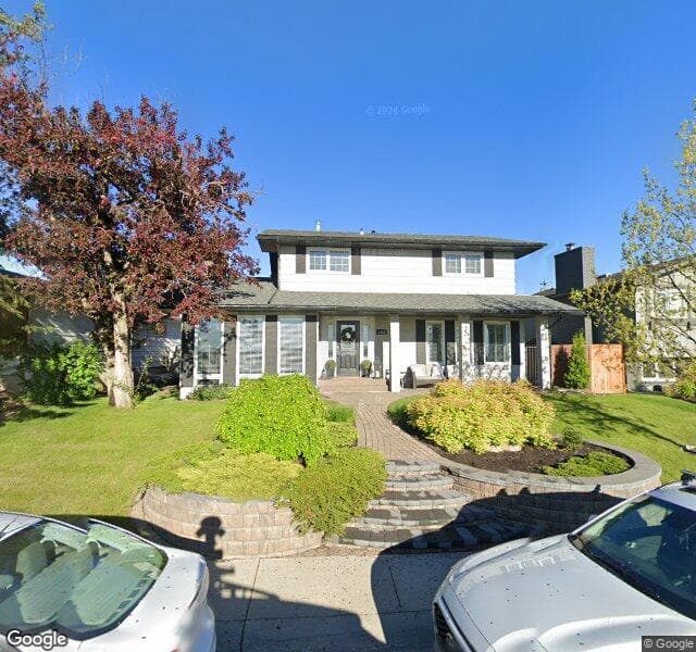 Street view of 1443 Lake Bonavista Drive SE, Calgary