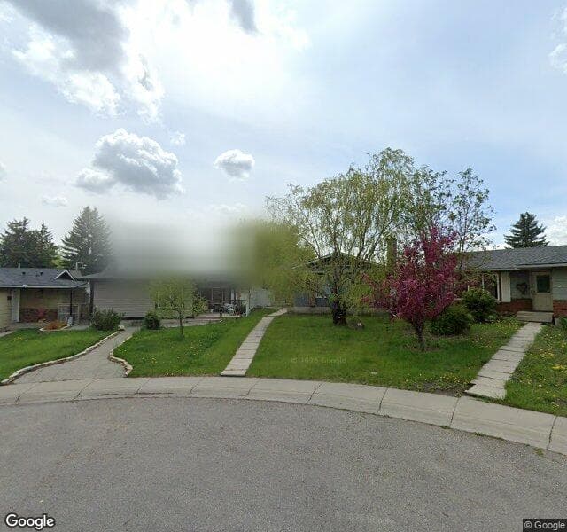 Street view of 64 Midlawn Place SE, Calgary