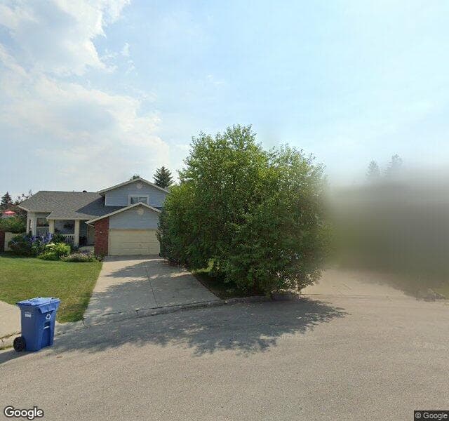 Street view of 119 Wood Valley Court SW, Calgary