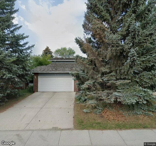 Street view of 71 Woodacres Drive SW, Calgary