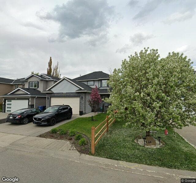 Street view of 68 Chaparral Crescent SE, Calgary