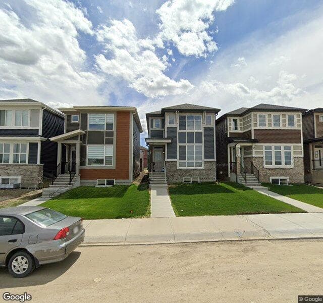 Street view of 67 Corner Meadows Manor NE, Calgary