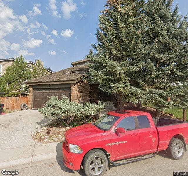 Street view of 19 Woodgrove Crescent SW, Calgary