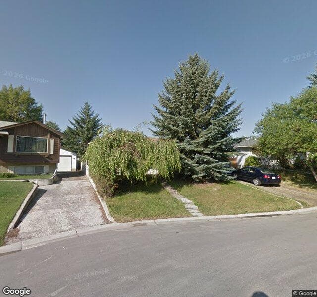 Street view of 223 Lynnbrook Close SE, Calgary