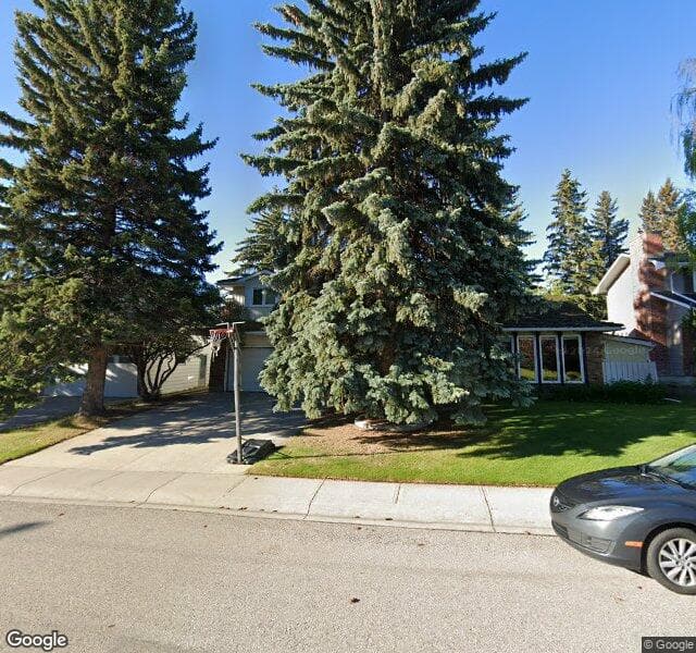 Street view of 128 Lake Erie Place SE, Calgary