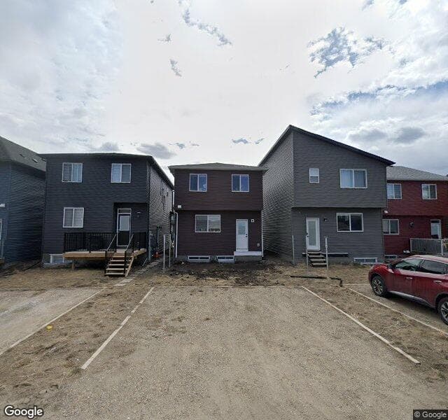 Street view of 320 Livingston View NW, Calgary