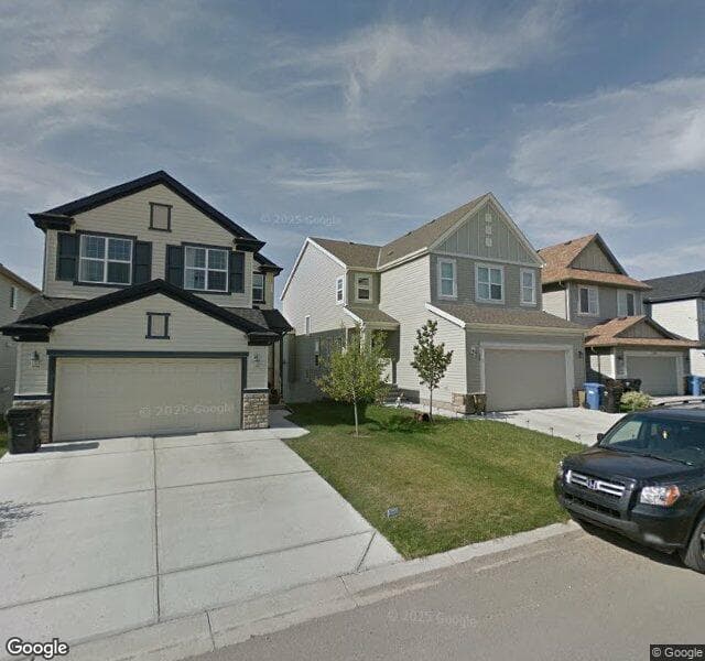 Street view of 312 Copperpond Circle SE, Calgary