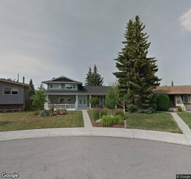 Street view of 72 Lake Lucerne Close SE, Calgary