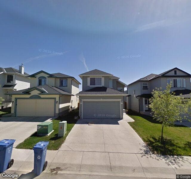 Street view of 1042 Bridlemeadows Manor SW, Calgary