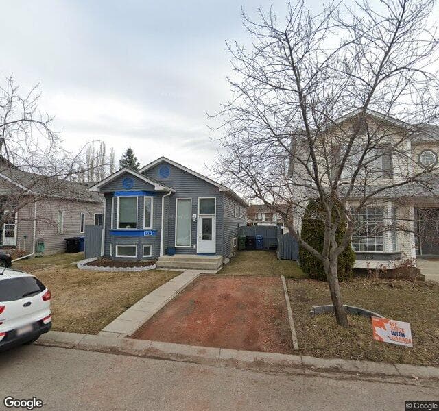 Street view of 332 River Rock Circle SE, Calgary
