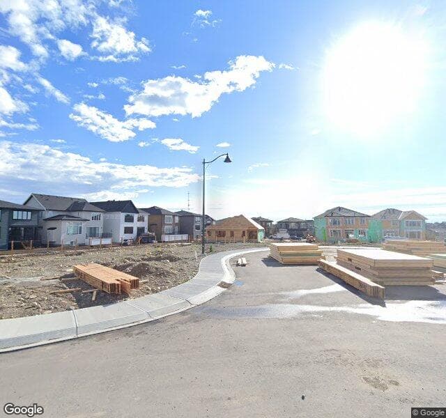 Street view of 218 Aspen Summit Place SW, Calgary