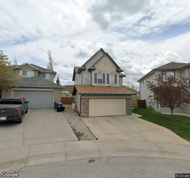 Street view of 97 Rockbluff Place NW, Calgary