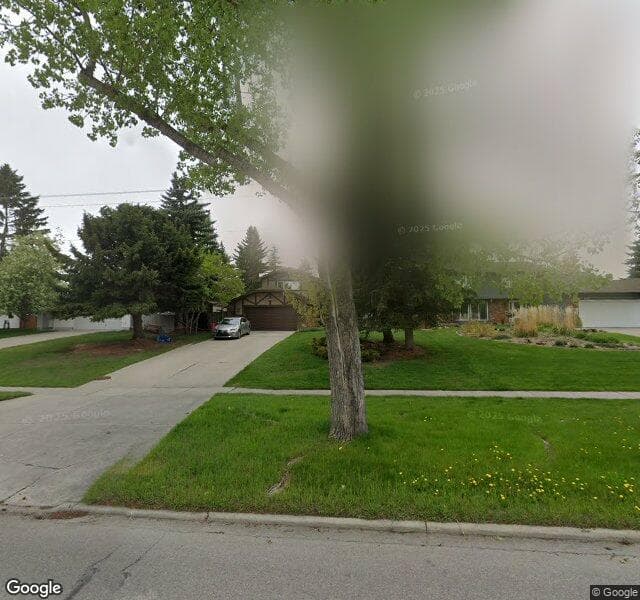Street view of 1417 Acadia Drive SE, Calgary