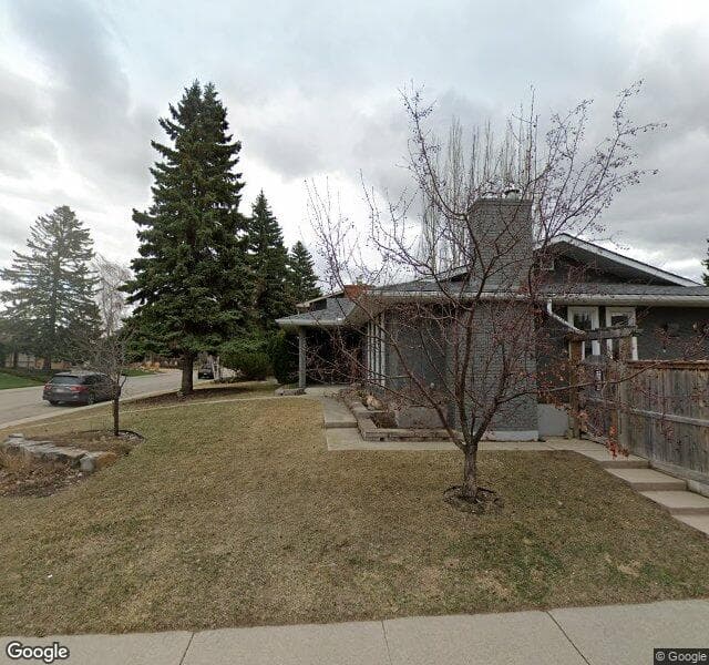 Street view of 723 Lake Lucerne Drive SE, Calgary