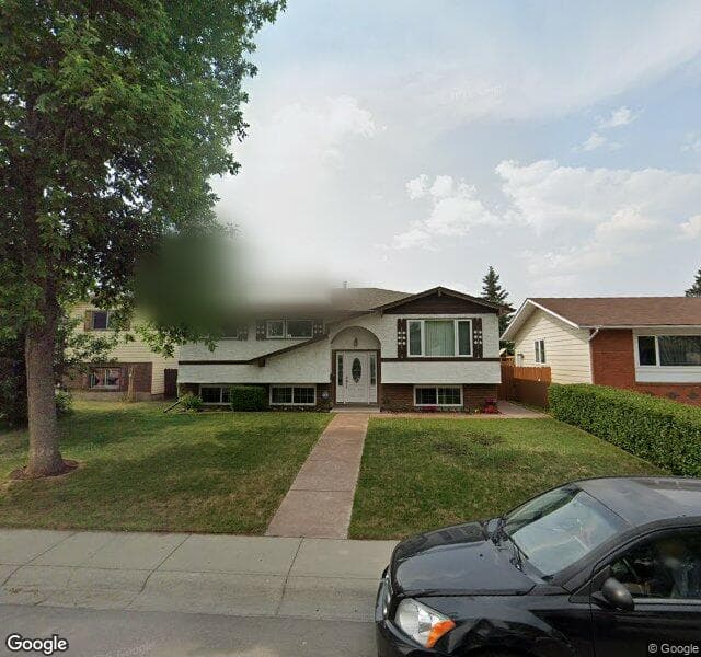 Street view of 967 Rundlecairn Way NE, Calgary