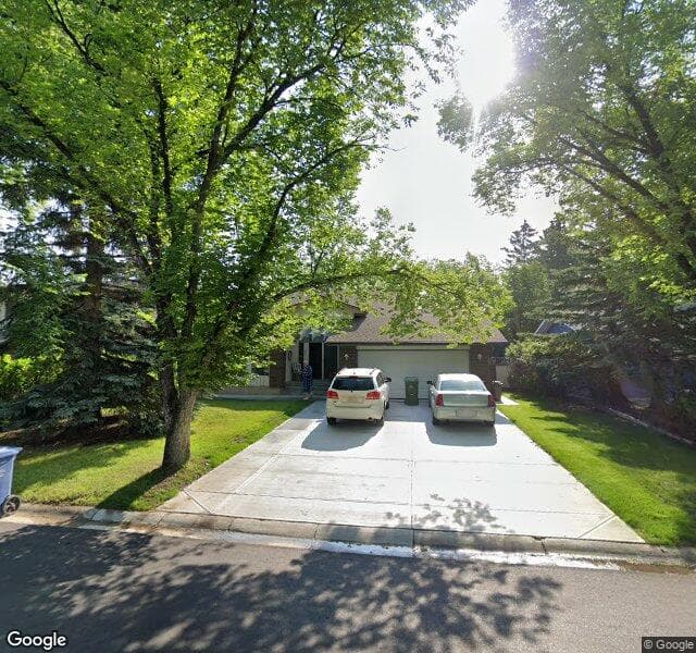 Street view of 864 Woodpark Way SW, Calgary
