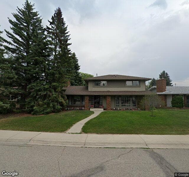 Street view of 932 Lake Arrow Way SE, Calgary