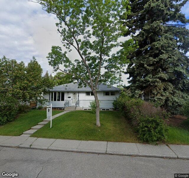 Street view of 128 Glenpatrick Drive SW, Calgary