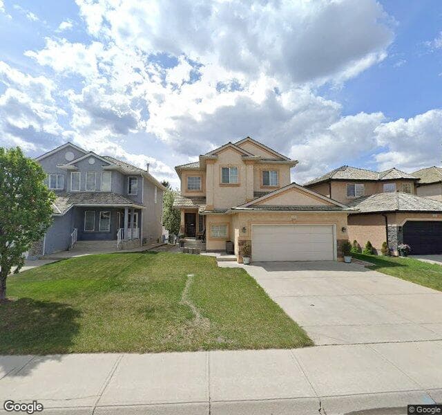 Street view of 1323 Harvest Hills Drive NE, Calgary