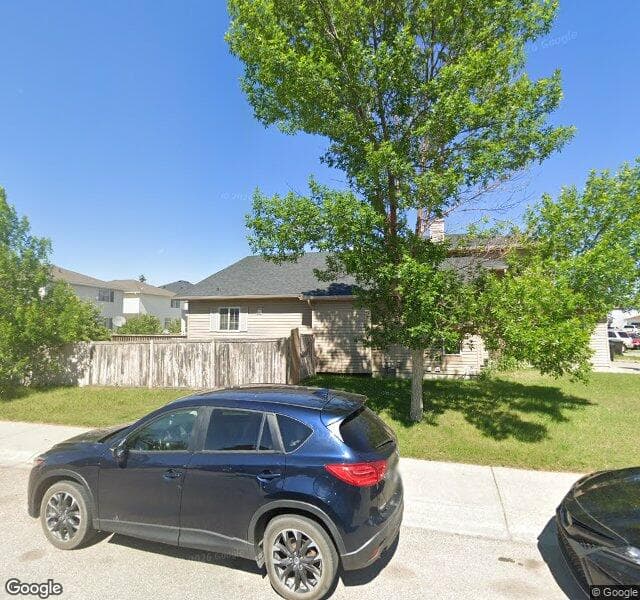 Street view of 401 Coral Springs Place NE, Calgary