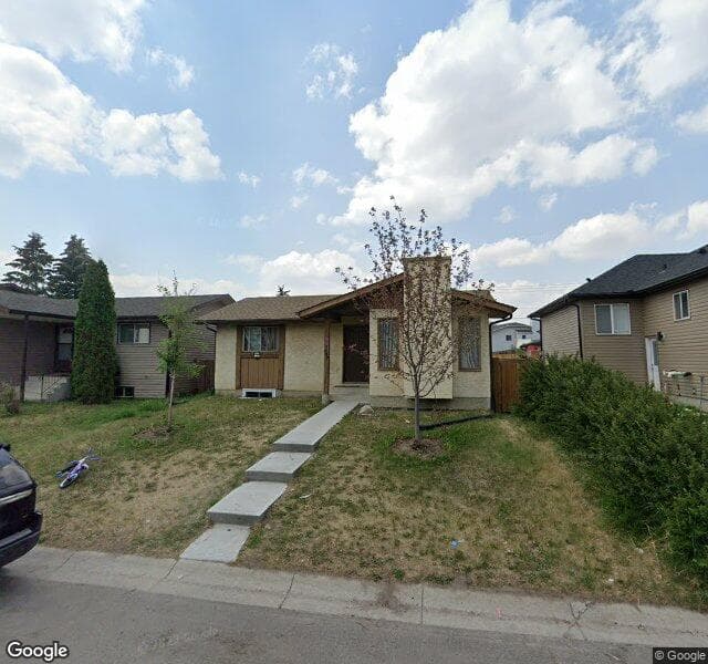 Street view of 100 Falchurch Crescent NE, Calgary