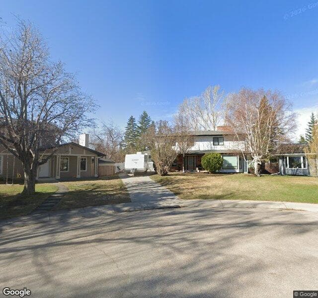 Street view of 1103 Lake Sylvan Place SE, Calgary
