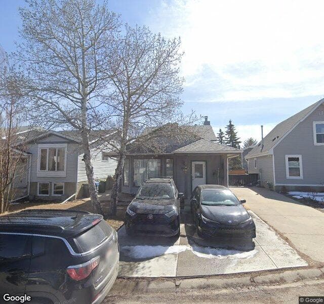 Street view of 76 Riverbrook Way SE, Calgary