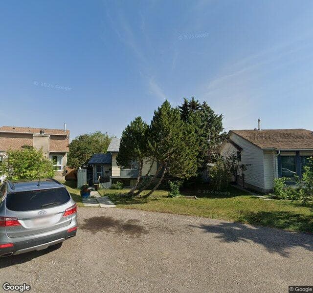 Street view of 19 Pinemeadow Place NE, Calgary