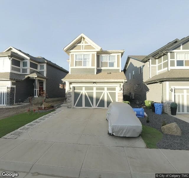 Street view of 124 Magnolia Manor SE, Calgary