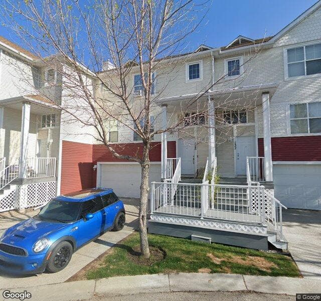 Street view of 128 Country Village Cape NE, Calgary
