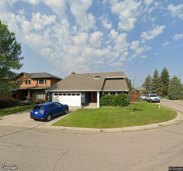 Street view of 23 Woodgreen Crescent SW, Calgary