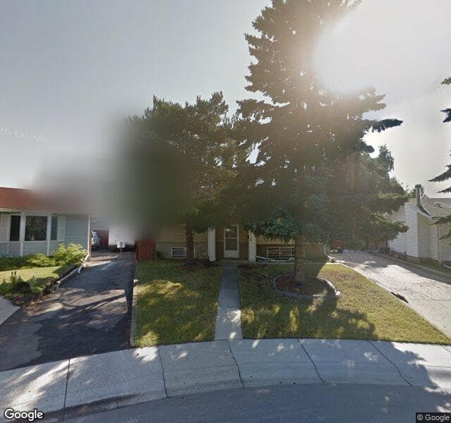 Street view of 212 Lynnbrook Close SE, Calgary