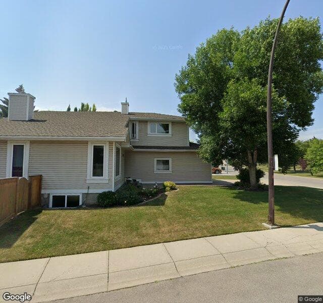 Street view of 2205 Woodpark Avenue SW, Calgary