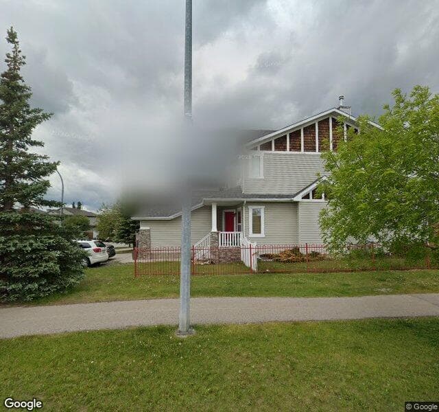 Street view of 4 Rockywood Park NW, Calgary