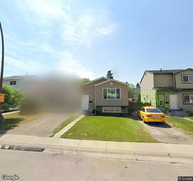 Street view of 100 Abingdon Court NE, Calgary