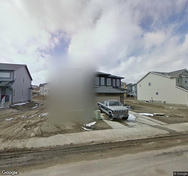 Street view of 1093 Panamount Boulevard NW, Calgary