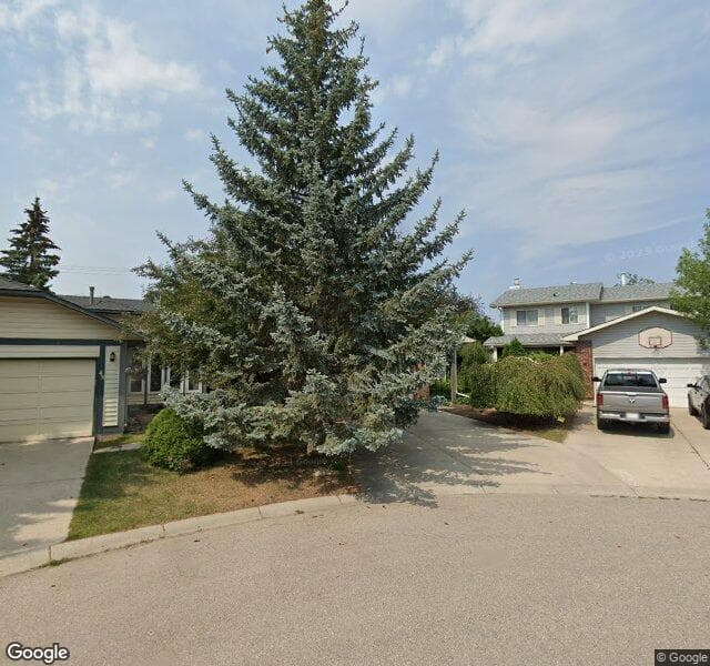 Street view of 44 Woodborough Place SW, Calgary