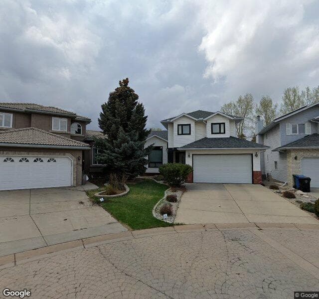 Street view of 214 Hawktree Bay NW, Calgary