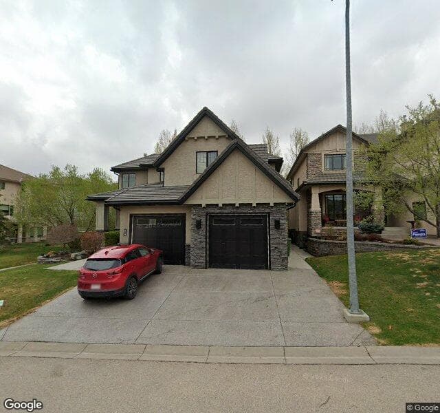 Street view of 68 Hamptons Cove NW, Calgary