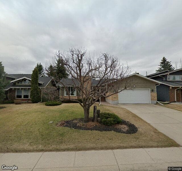 Street view of 2120 Lake Bonavista Drive SE, Calgary