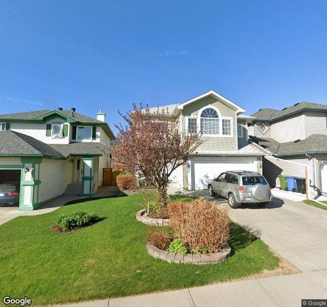 Street view of 152 Hidden Spring Close NW, Calgary