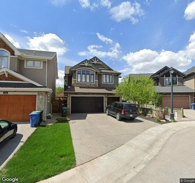 Street view of 107 W Coach Way SW, Calgary