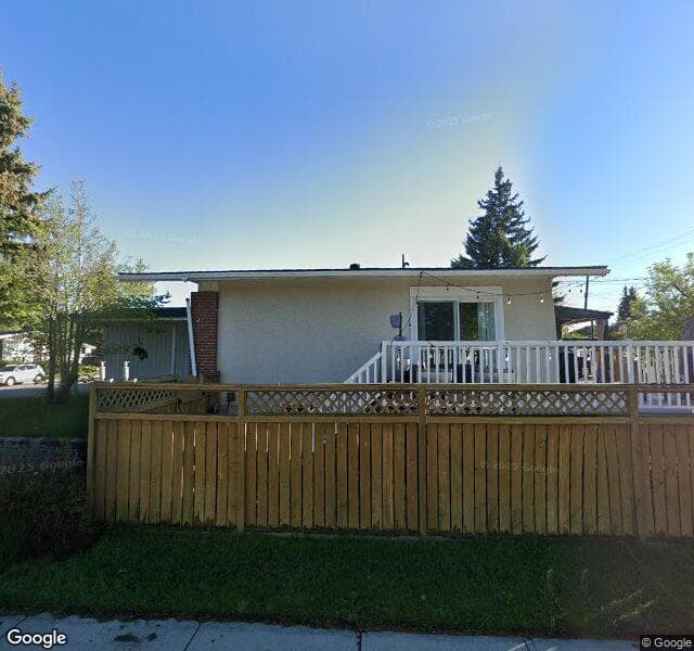 Street view of 1104 Lake Huron Crescent SE, Calgary