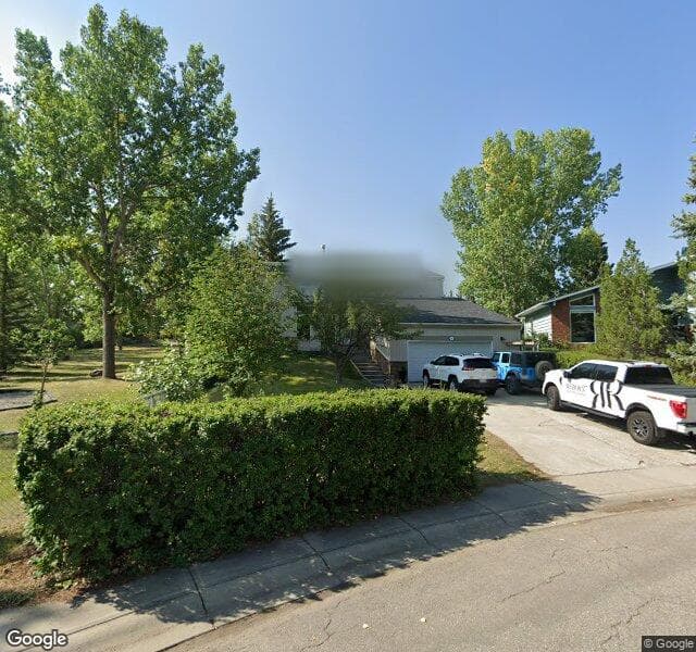 Street view of 147 Oakside Close SW, Calgary