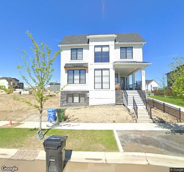 Street view of 42 Treeline Gardens SW, Calgary