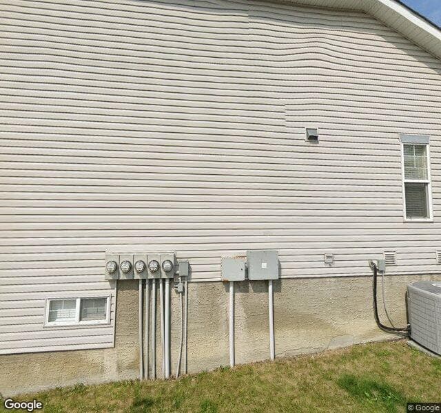 Street view of 69 Prestwick Pond Terrace SE, Calgary