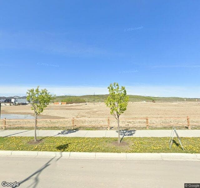 Street view of 68 Creekside Terrace SW, Calgary