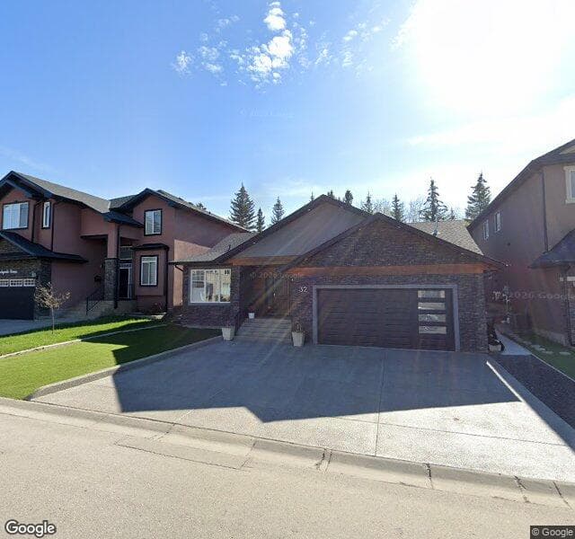 Street view of 32 Rockyvale Green NW, Calgary