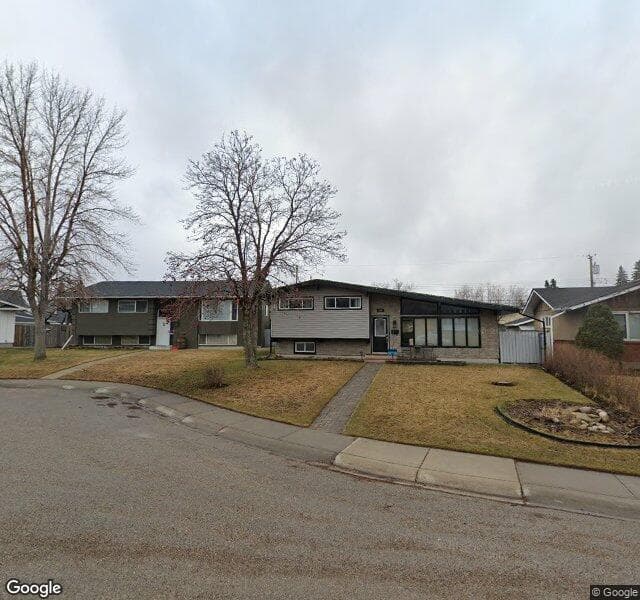 Street view of 208 Maple Court Crescent SE, Calgary