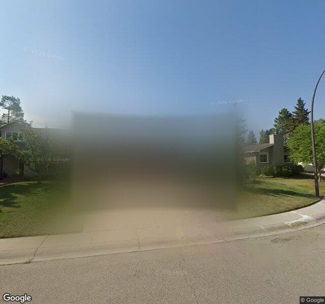 Street view of 215 Oakhampton Place SW, Calgary